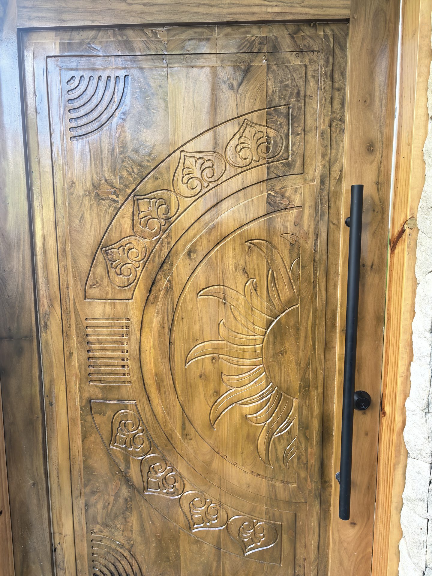 Hand-carved wooden entry door