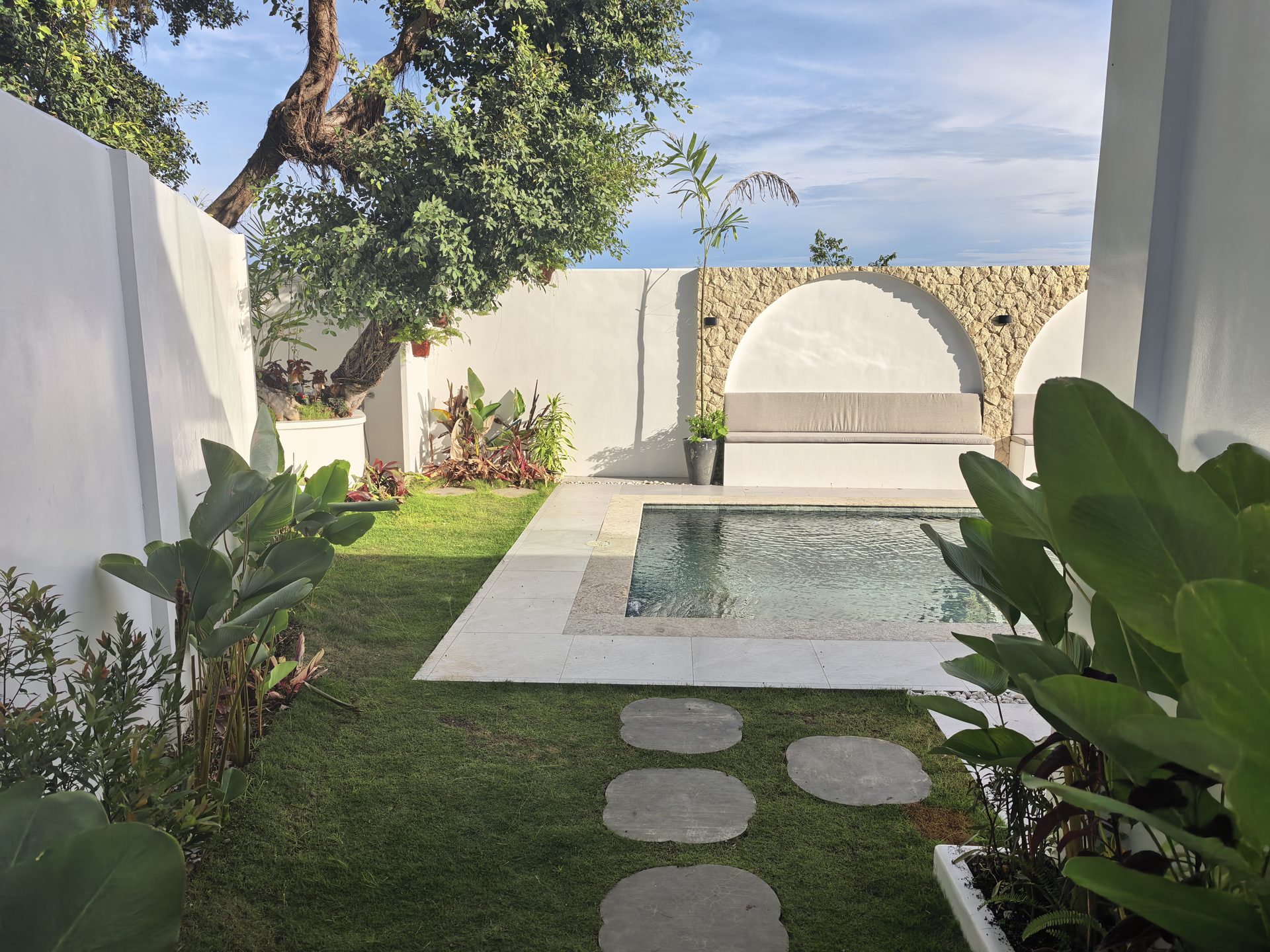 Garden pathway leading to pool