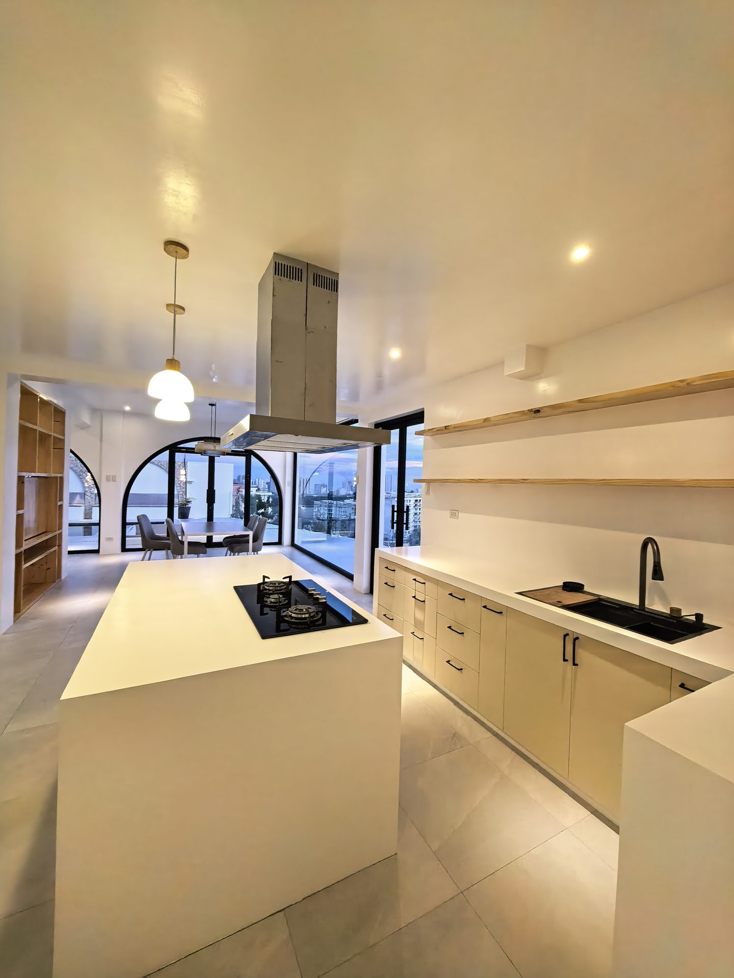 Modern kitchen with warm evening ambiance - Hacienda Salinas luxury home