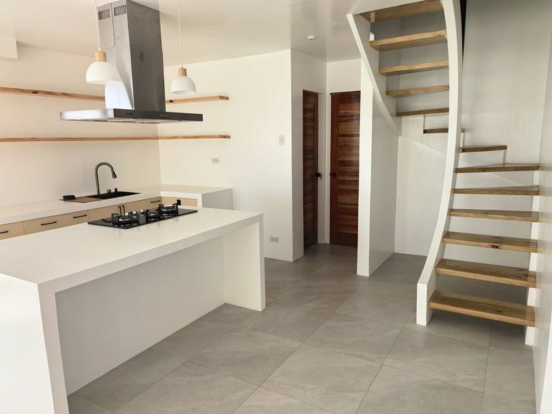 Kitchen island and floating staircase
